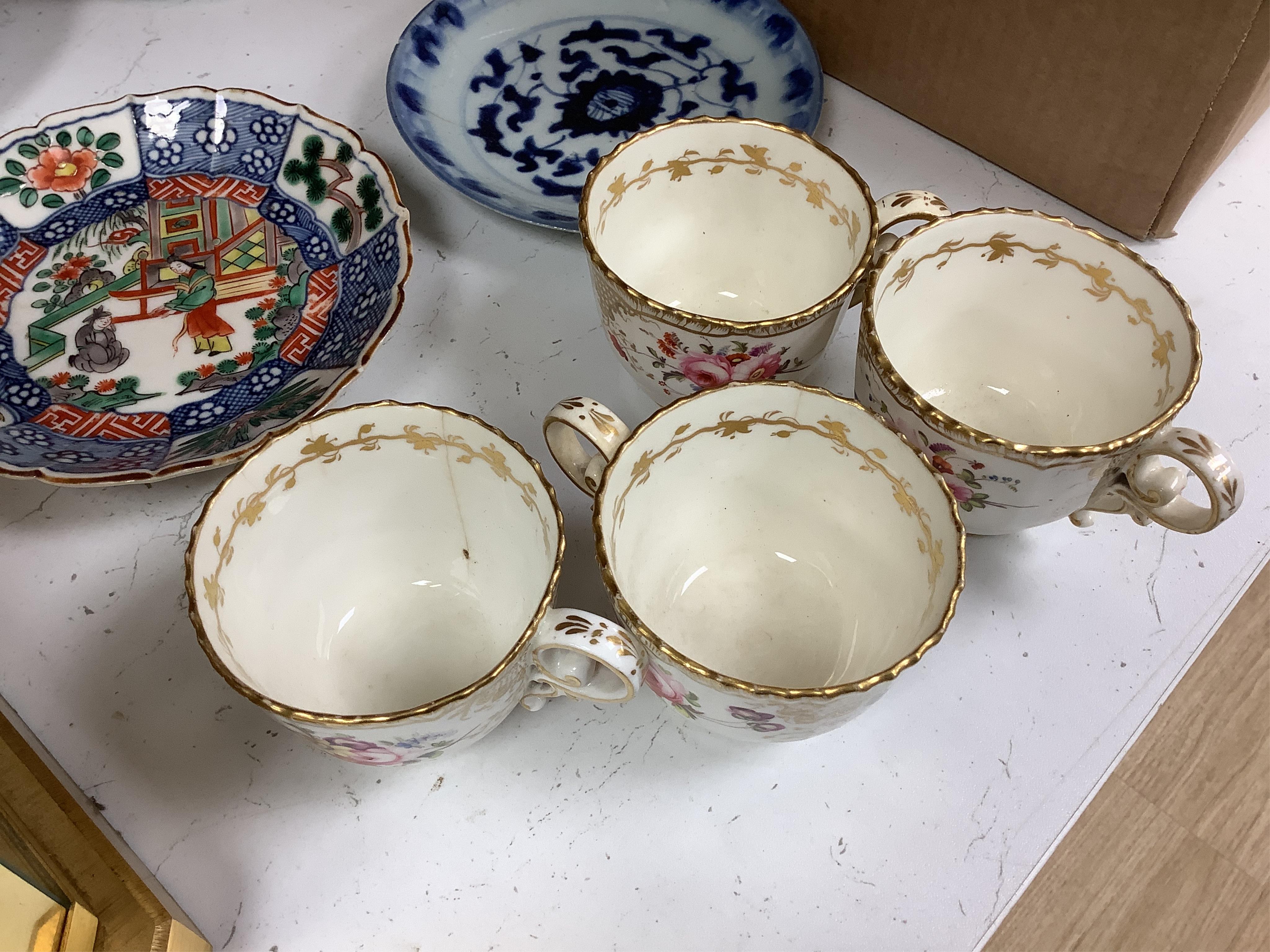 A Coalport floral part teaset, c.1825, to include teapot, sandwich plates and cups & saucers. Condition - poor to fair